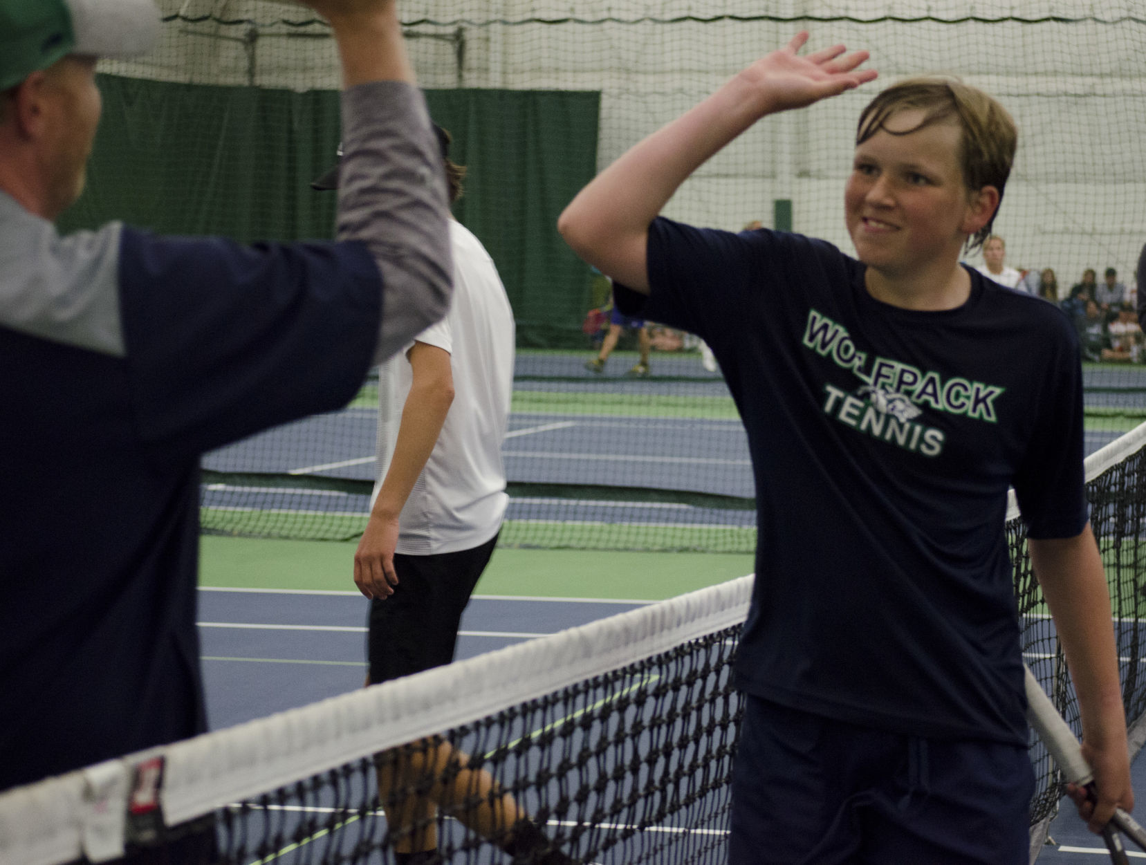 Rory Smith high fives his coach